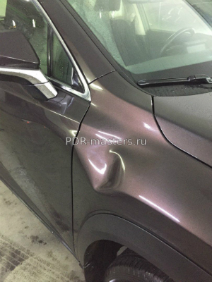 Выпрямление и ремонт вмятины на крыле автомобиля Вытягивание вмятины без покраски на кузове автомобиля