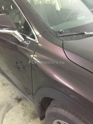 Вытягивание и ремонт вмятины на крыле автомобиля Выпрямление вмятины без покраски на кузове автомобиля