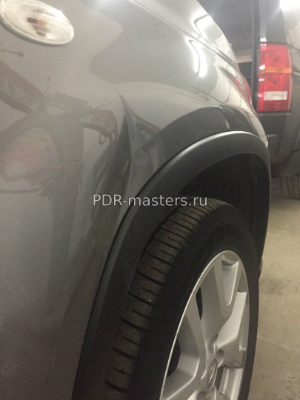 Удаление и ремонт вмятины на крыле автомобиля Ремонт вмятины на крыле автомобиля